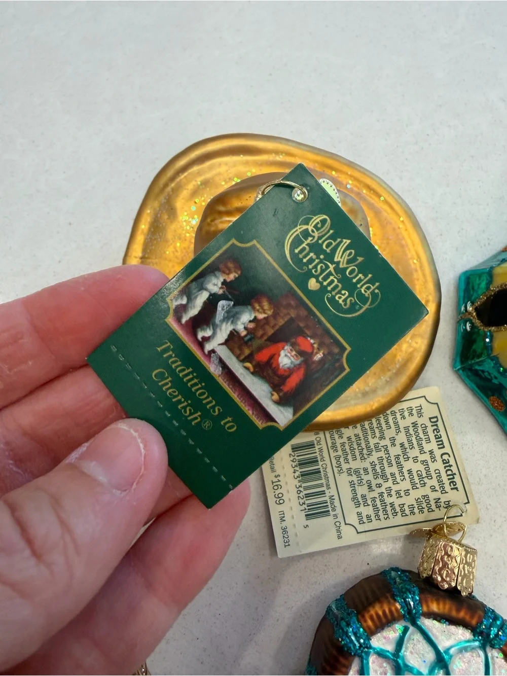 Lot of old world Christmas ornaments cowboy themed